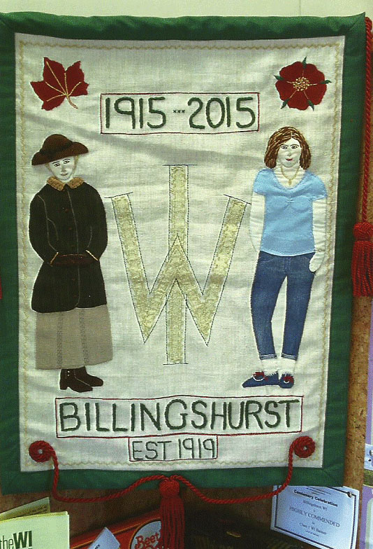 a banner with a woman from 1915 and a woman from 2015 either side of the womens institute logo