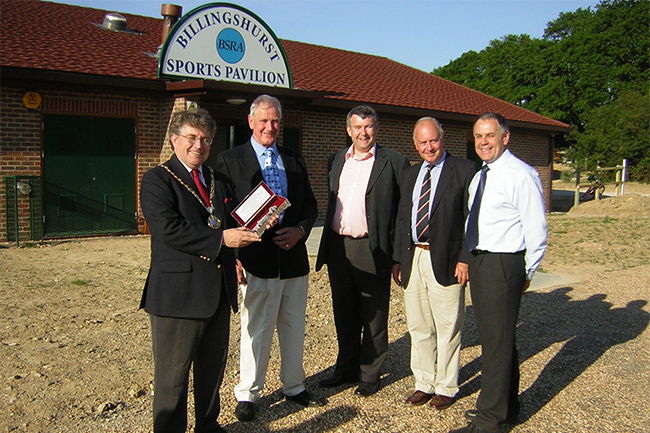 pavilion with officials outside